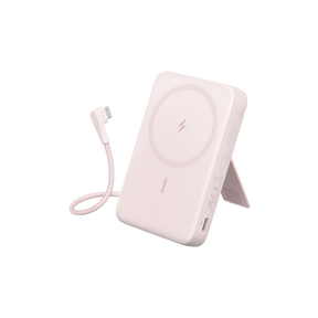 Pink wireless charging pad with cable on a white background