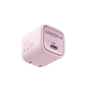 Pink Anker power adapter on a white background